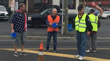 KofC members collecting coins in traffic